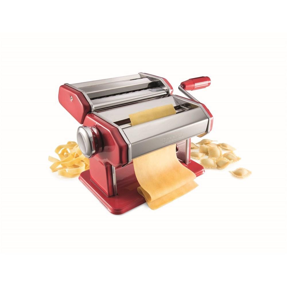 Fresh pasta being produced with surrounding pasta pieces - red Baccarat pasta machine 150mm ii