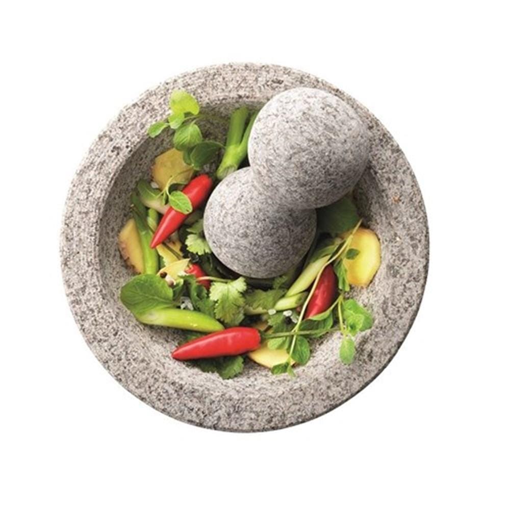 Vibrant vegetables and fresh herbs in mortar and pestle grey stone - Baccarat spice market delos
