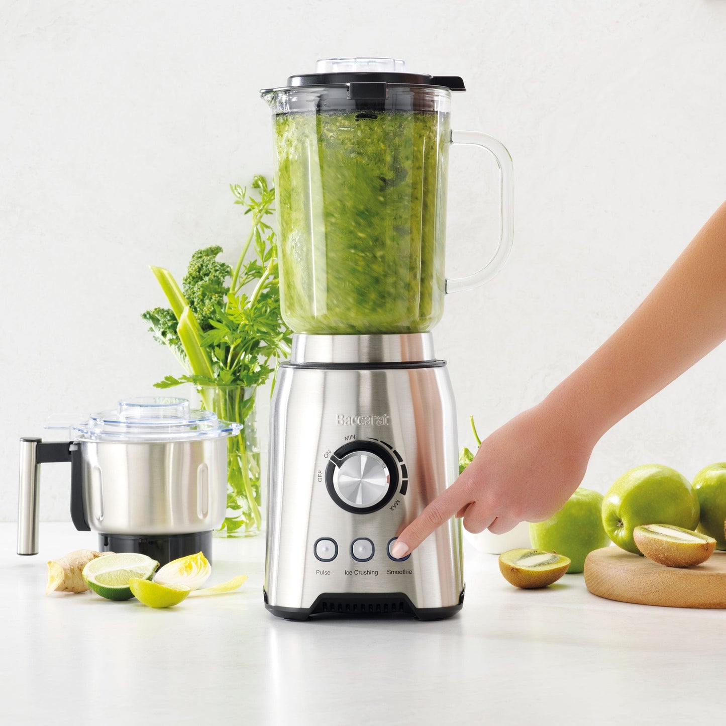 A vibrant countertop filled with fresh vegetables, produce and a powerful blender grinder - Baccarat