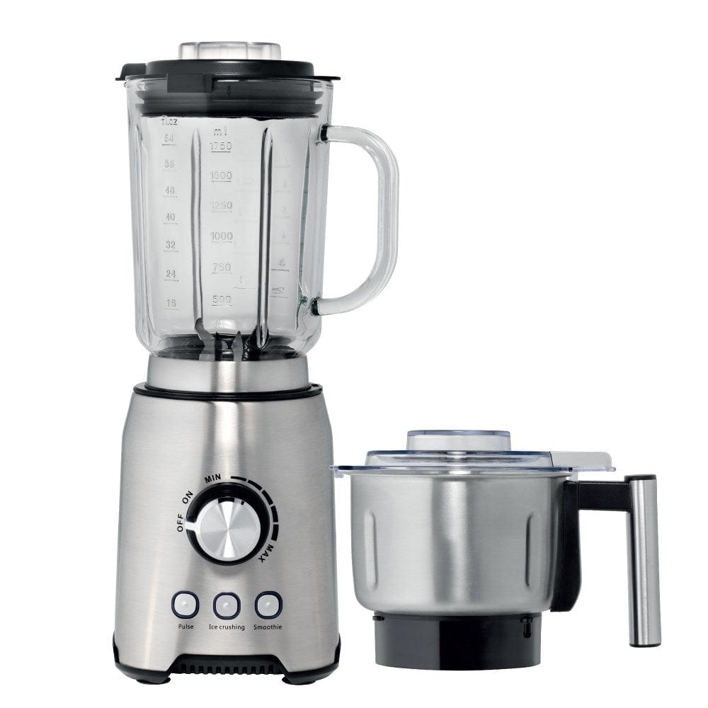 A vibrant countertop filled with fresh vegetables, produce and a powerful blender grinder - Baccarat