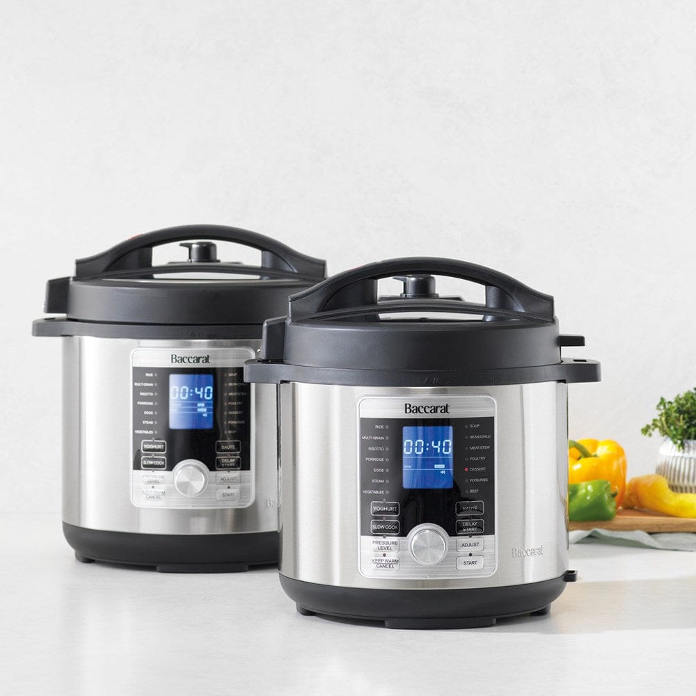Aerial view of open black lid and stainless steel body - stew in a digital multicooker - Baccarat