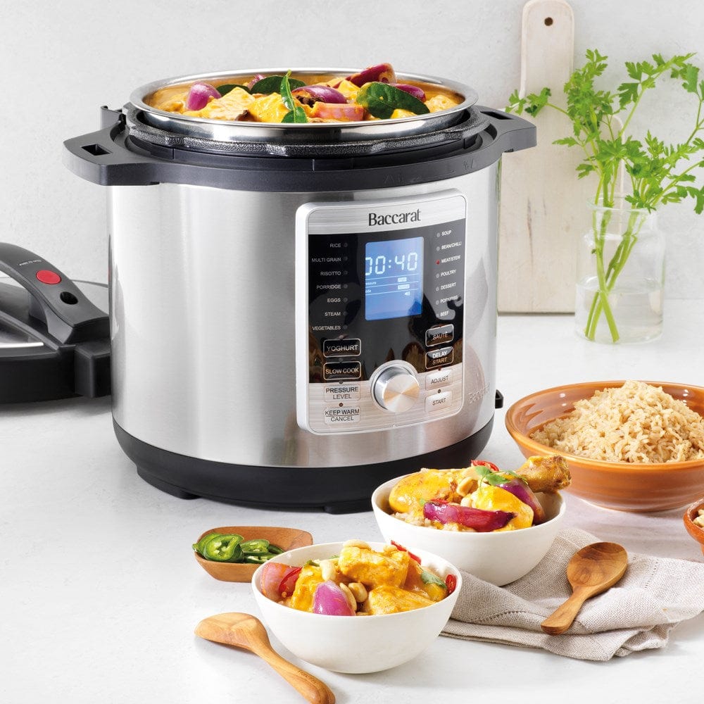 Aerial view of open black lid and stainless steel body - stew in a digital multicooker - Baccarat