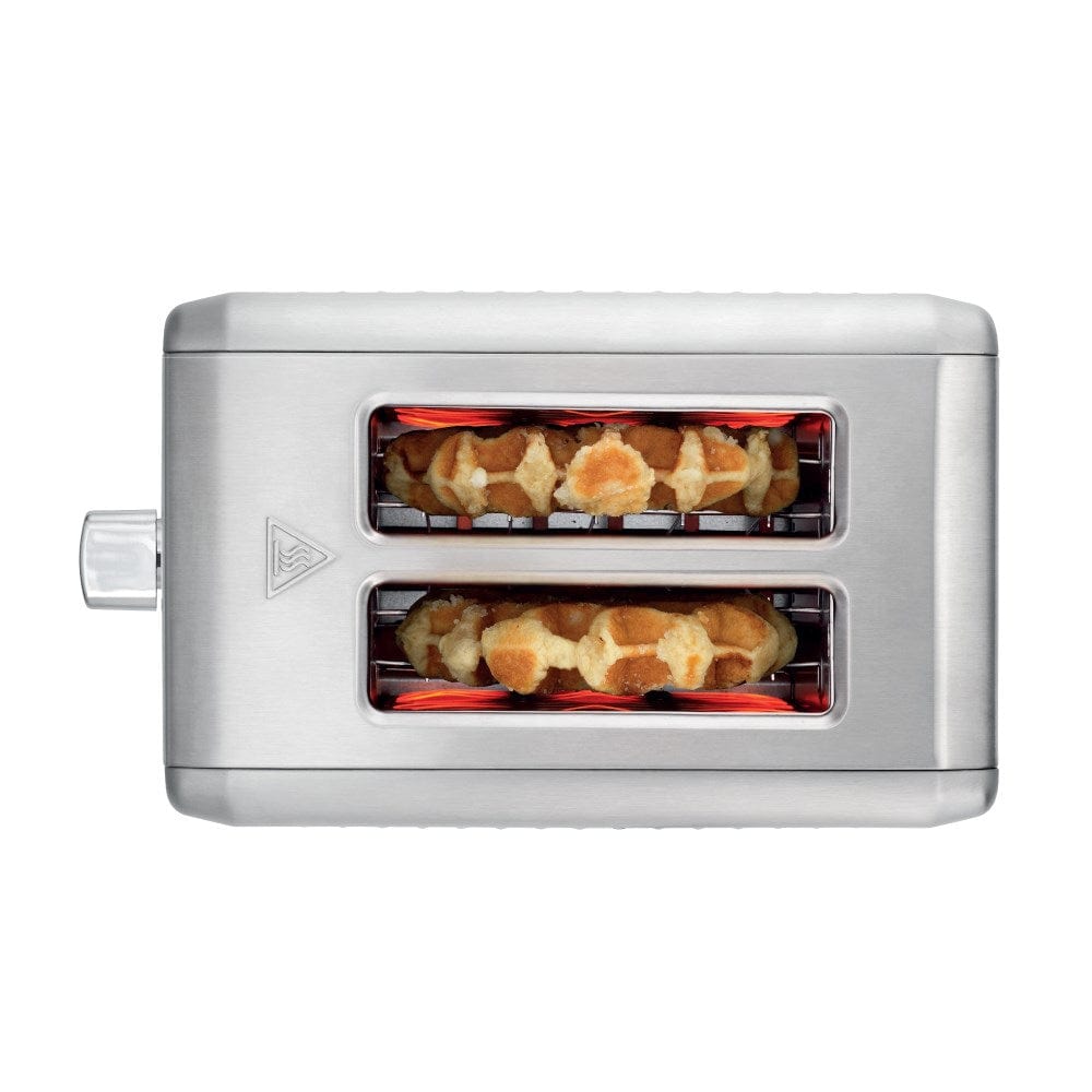 A stylish toaster with golden toast and fresh fruit in a bright kitchen silver toaster - Baccarat