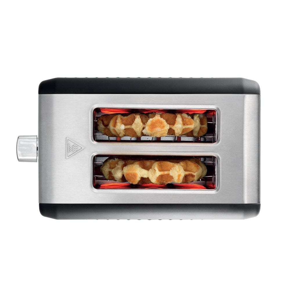 sleek black toaster surrounded by fresh bread and vibrant green avocados - Baccarat the toasty slice