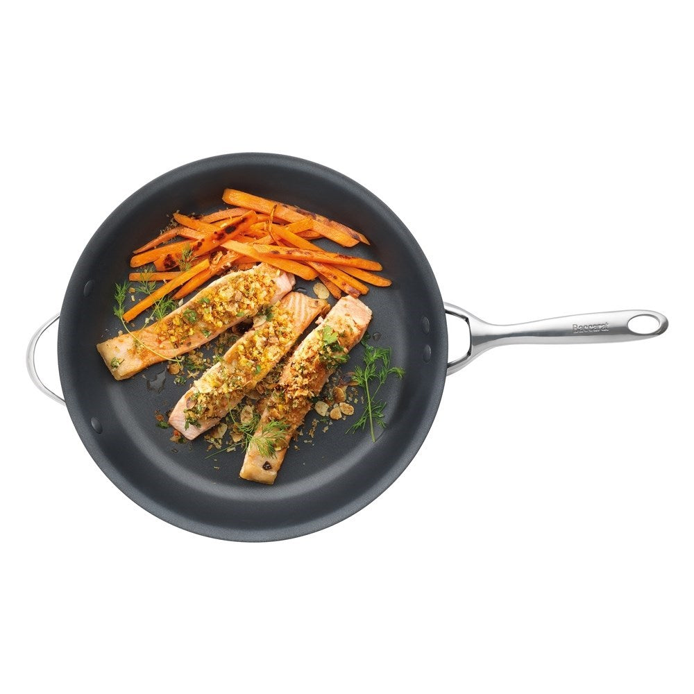A durable non stick frypan with helper handles featuring grilled salmon and carrots - Baccarat