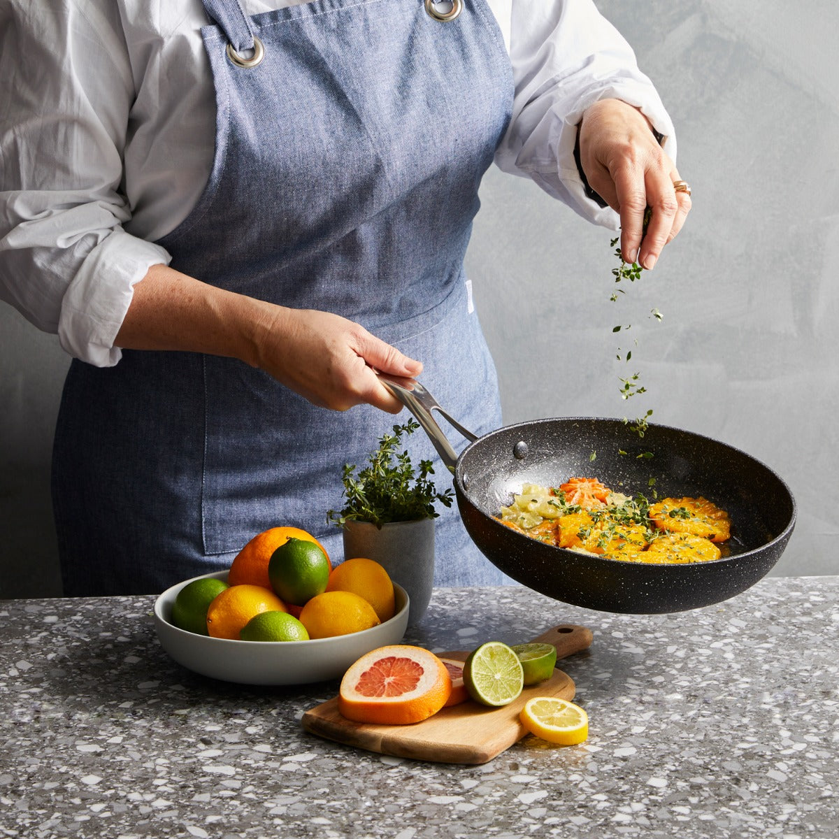 Vibrant vegetables cooking in a sleek frying pan on a stylish countertop - Baccarat Rock Frypan 16cm