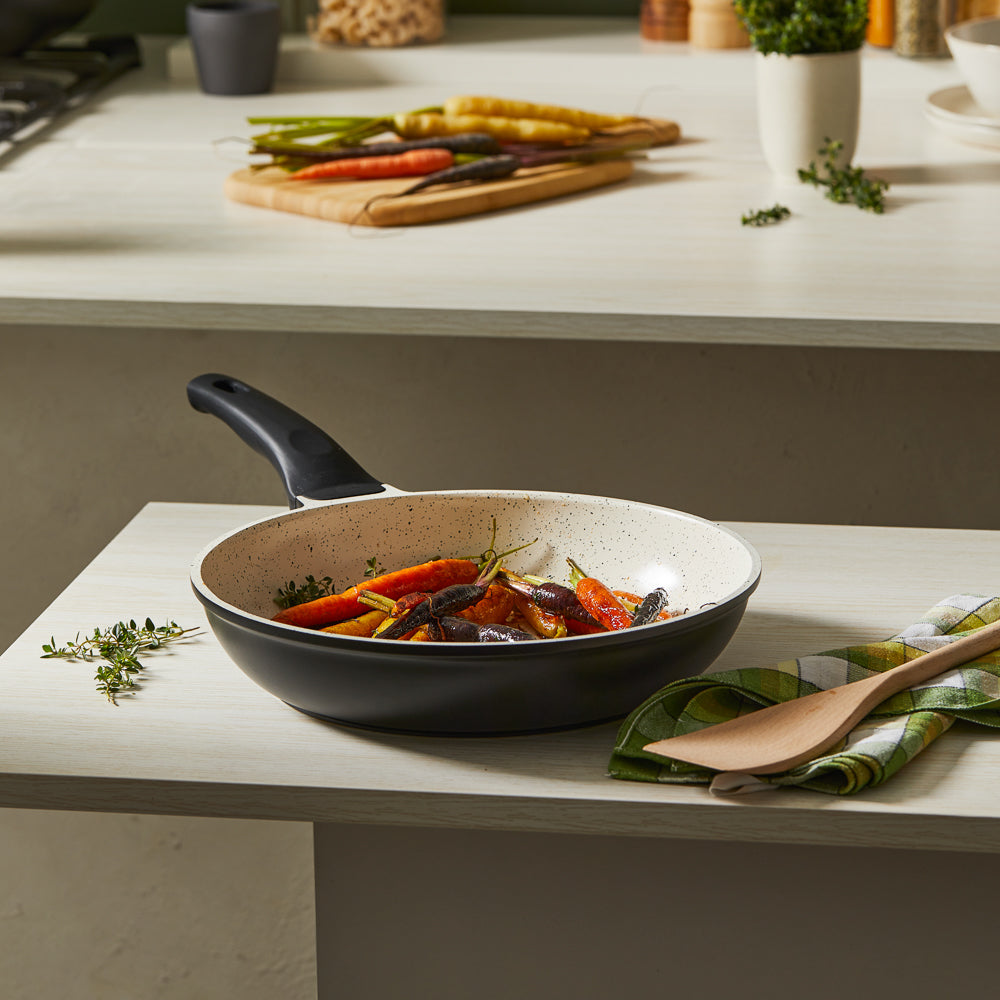 roasted vegetables on a beige interior kitchen counter - Baccarat ceramix non stick frypan 28cm