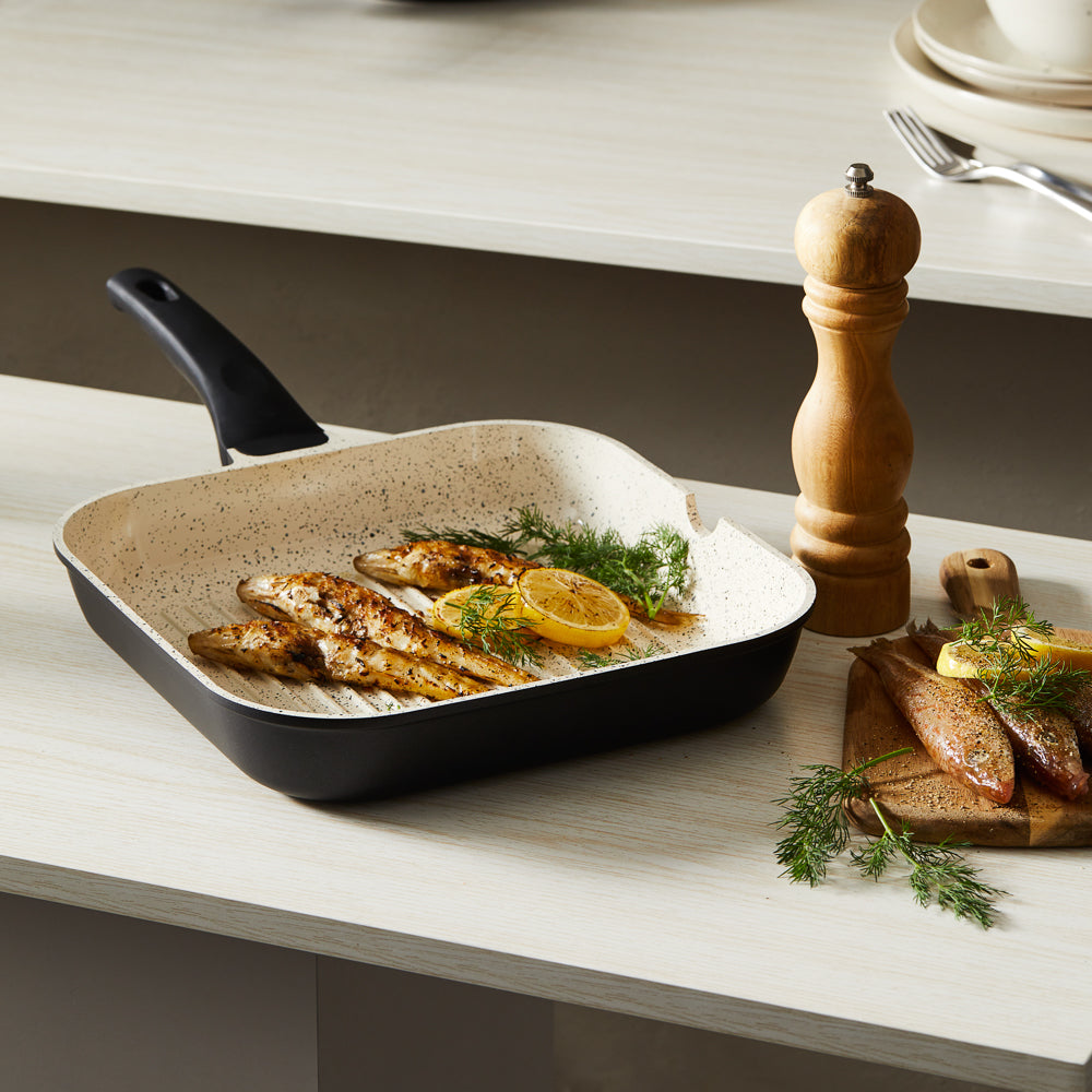 A non-stick frypan featuring a sleek design in white for effortless cooking - Baccarat Ceramix