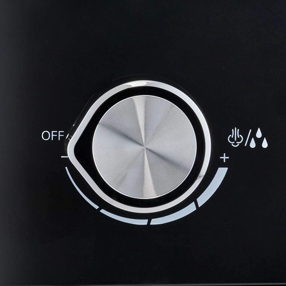 Control knob with 'OFF' and temperature adjustment symbols on a black background