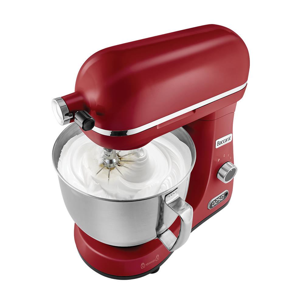 Red stand mixer with a silver bowl on a white background