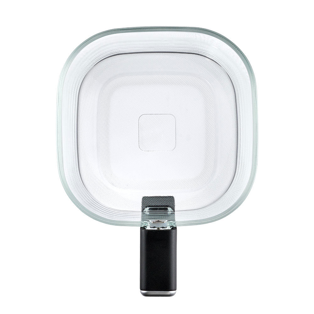 A top down view of clear air fryer with black handle on a white background.