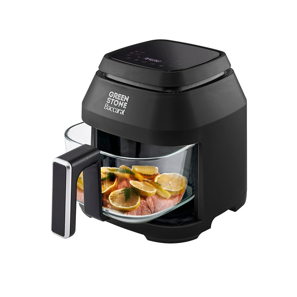 Black Green Stone Backfire air fryer with a glass basket containing cooked salmon and lemon slices, shown on a solid white background.