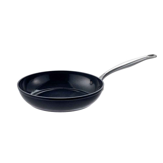 A non-stick frying pan with a sleek black surface and silver handle - Baccarat le connoisseur