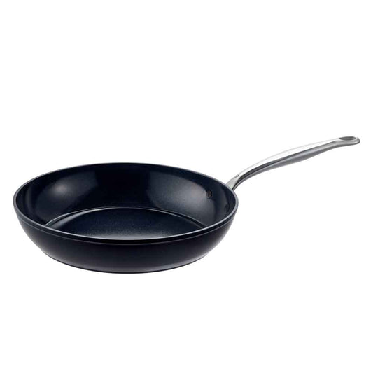 golden baked dish on a cloth featuring crispy edges ceramic frypan 24cm - Baccarat le connoisseur