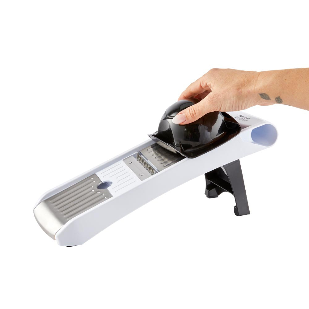 Close-up of a sleek mandoline slicer showcasing its precision blades and ergonomic design - Baccarat