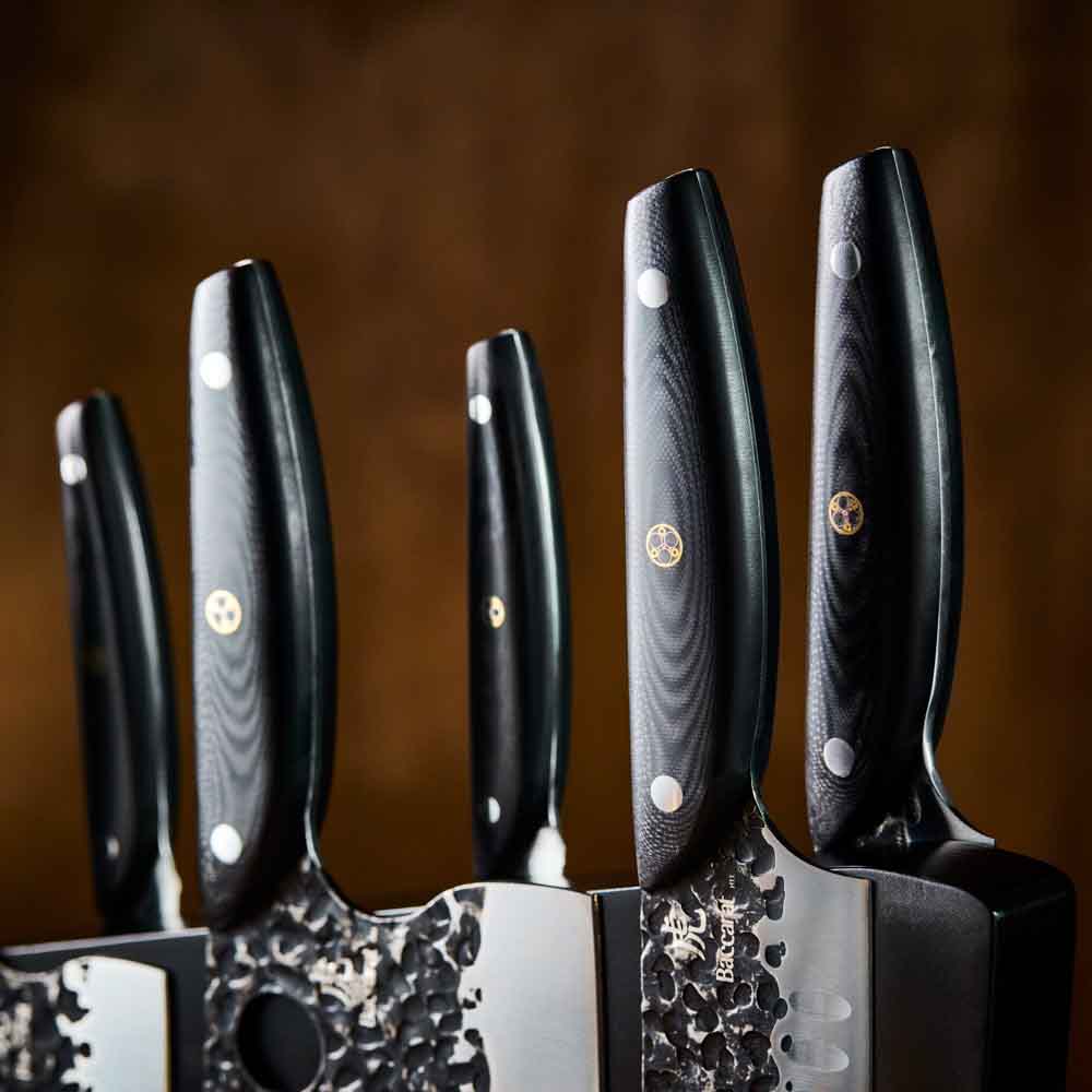 Baccarat KUROI KIBA 7 Piece Knife Block detail image of handles at Baccarat