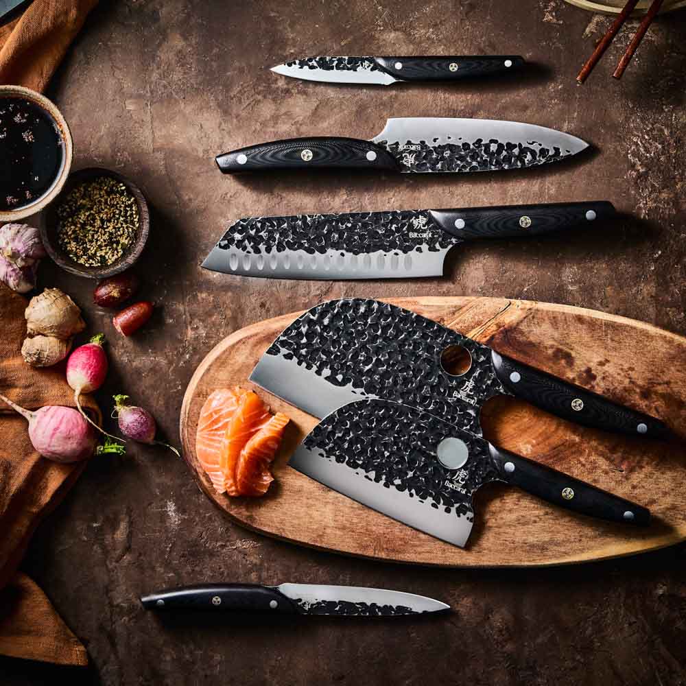 Baccarat KUROI KIBA 7 Piece Knife Block flat lay of knives at Baccarat