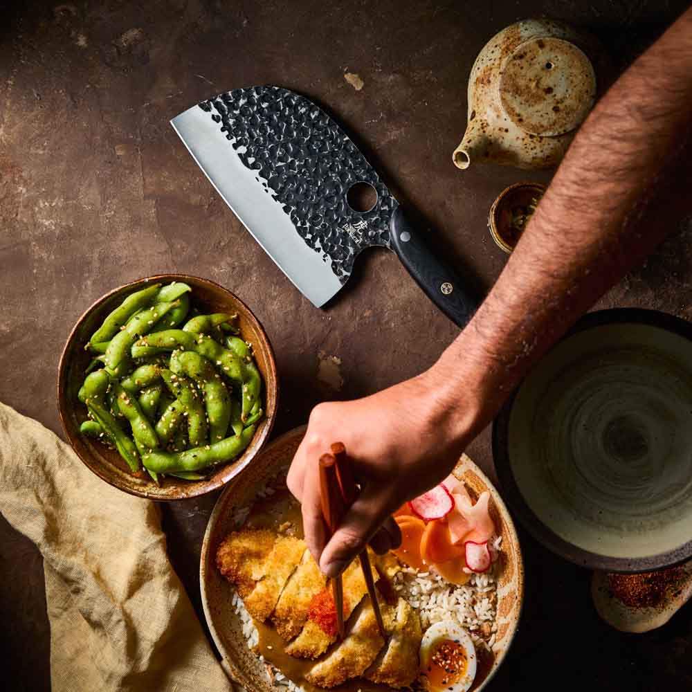Man eating katsu chicken - Baccarat KUROI KIBA Moon Knife 17.5cm at Baccarat