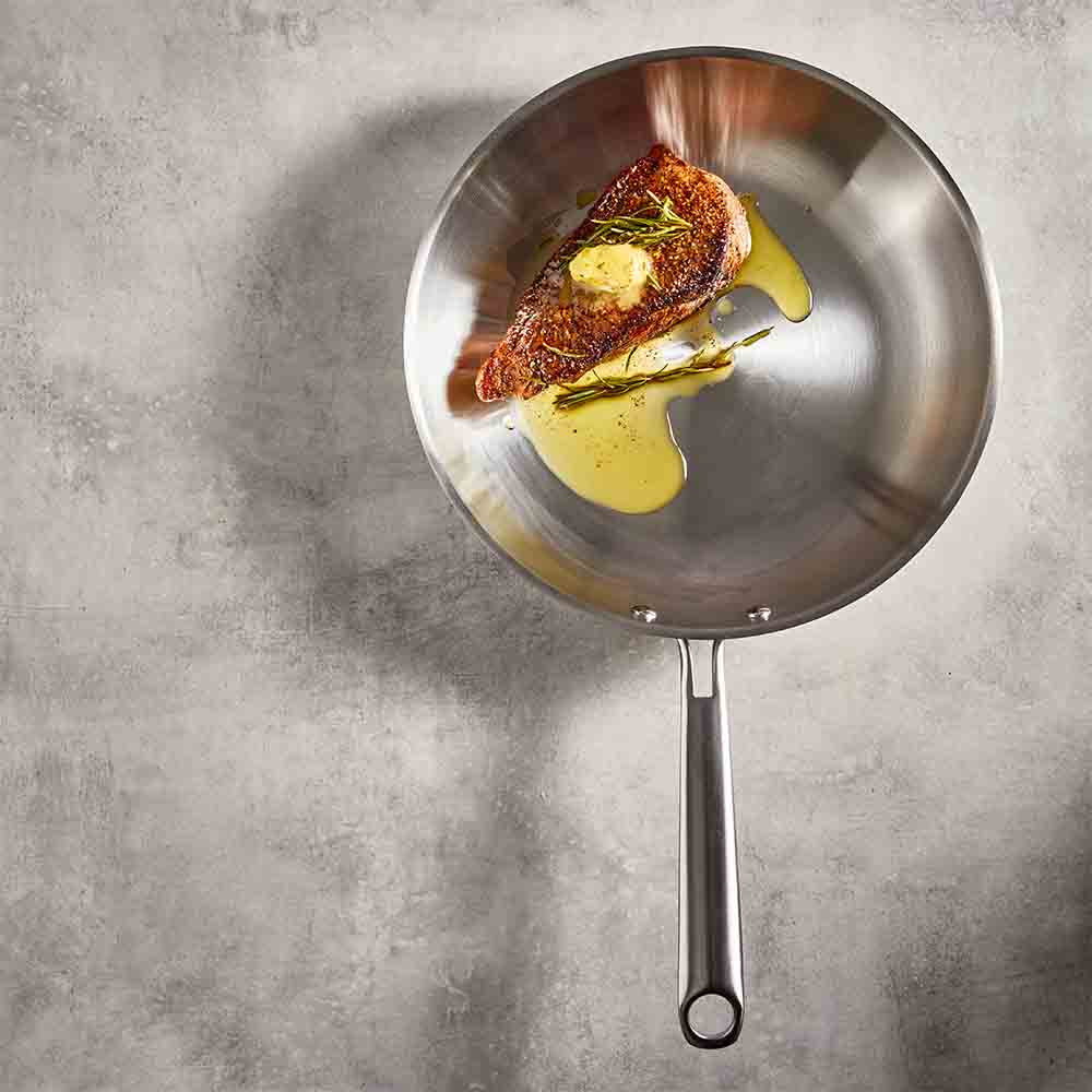 Baccarat Gourmet Stainless Steel Frypan 28cm with crispy skin fish fillet at Baccarat