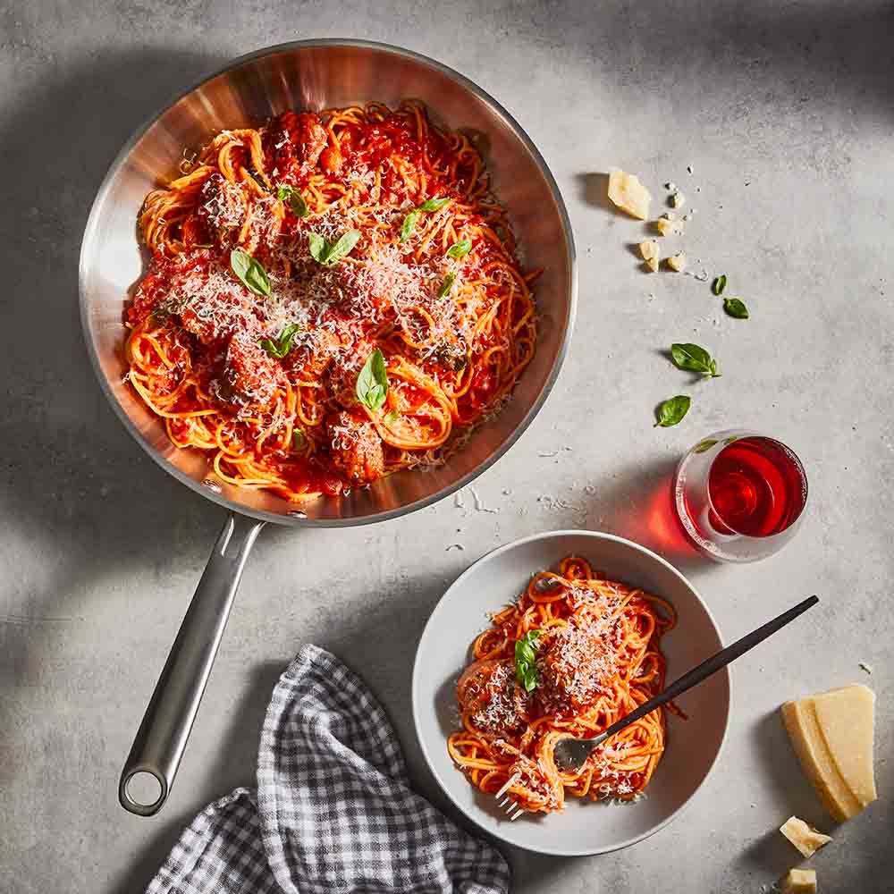 Baccarat Gourmet Stainless Steel Frypan 30cm with spaghetti bolognaise and side of parmesan at Baccarat