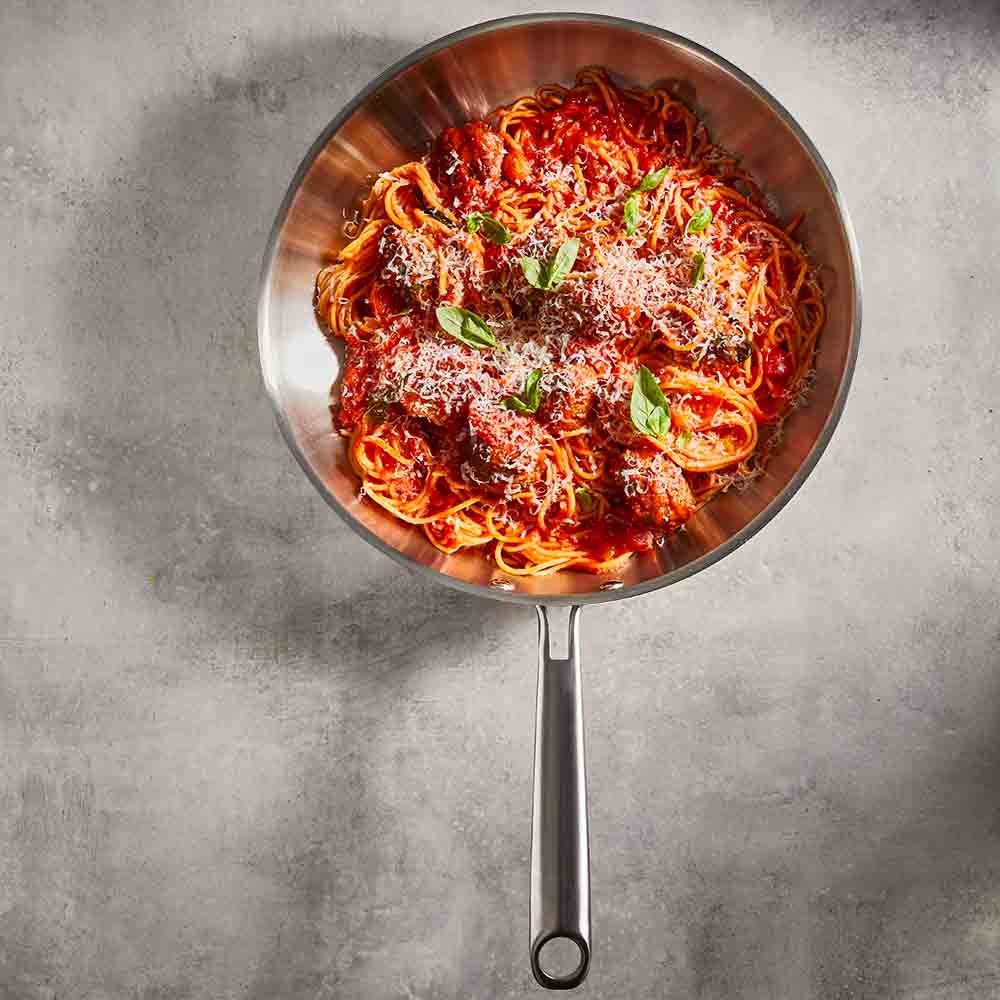 Baccarat Gourmet Stainless Steel Frypan 30cm with spaghetti bolognaise on grey kitchen counter at Baccarat