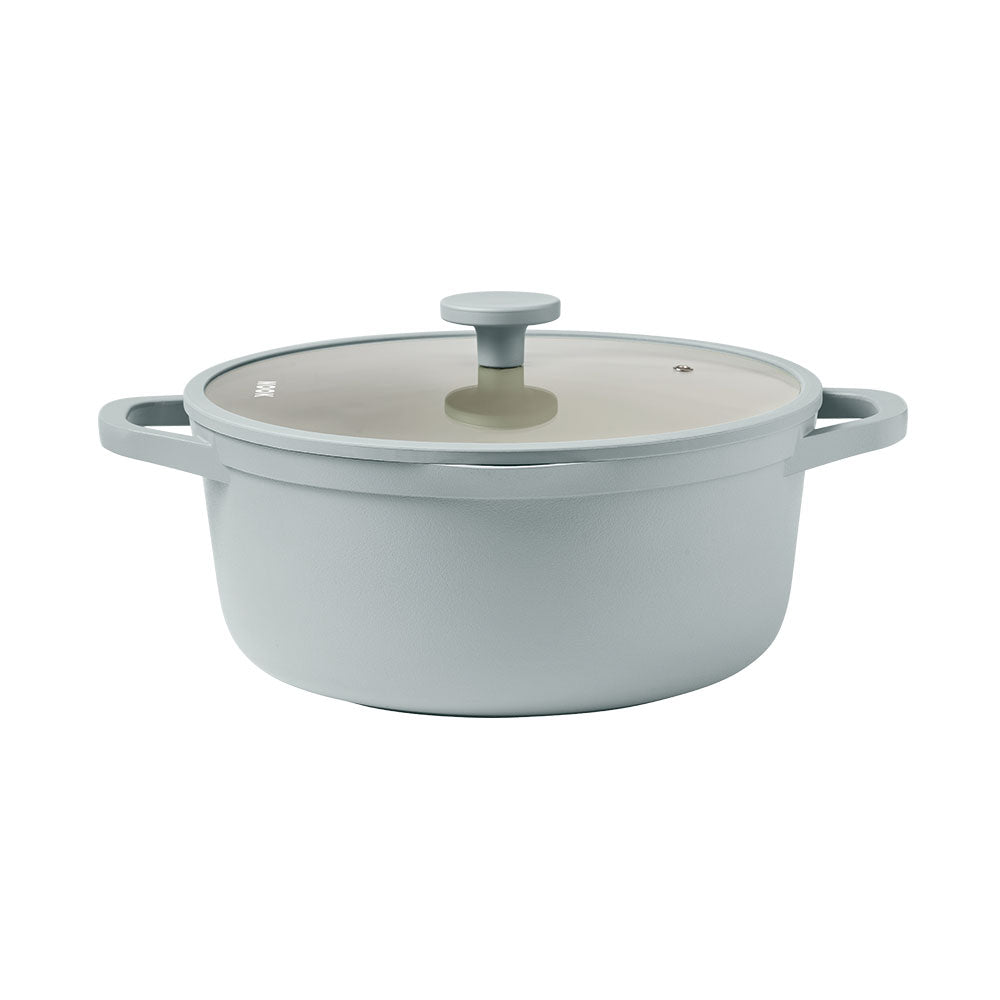Gray enameled cast iron Dutch oven with lid on a white background
