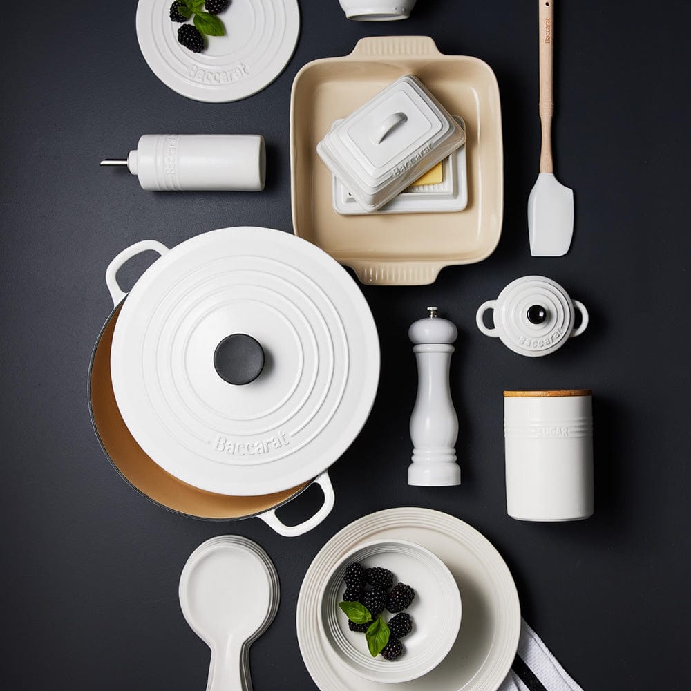 A flat lay of a sleek salt and pepper grinder in white and elegant design - Baccarat Le Connoisseur